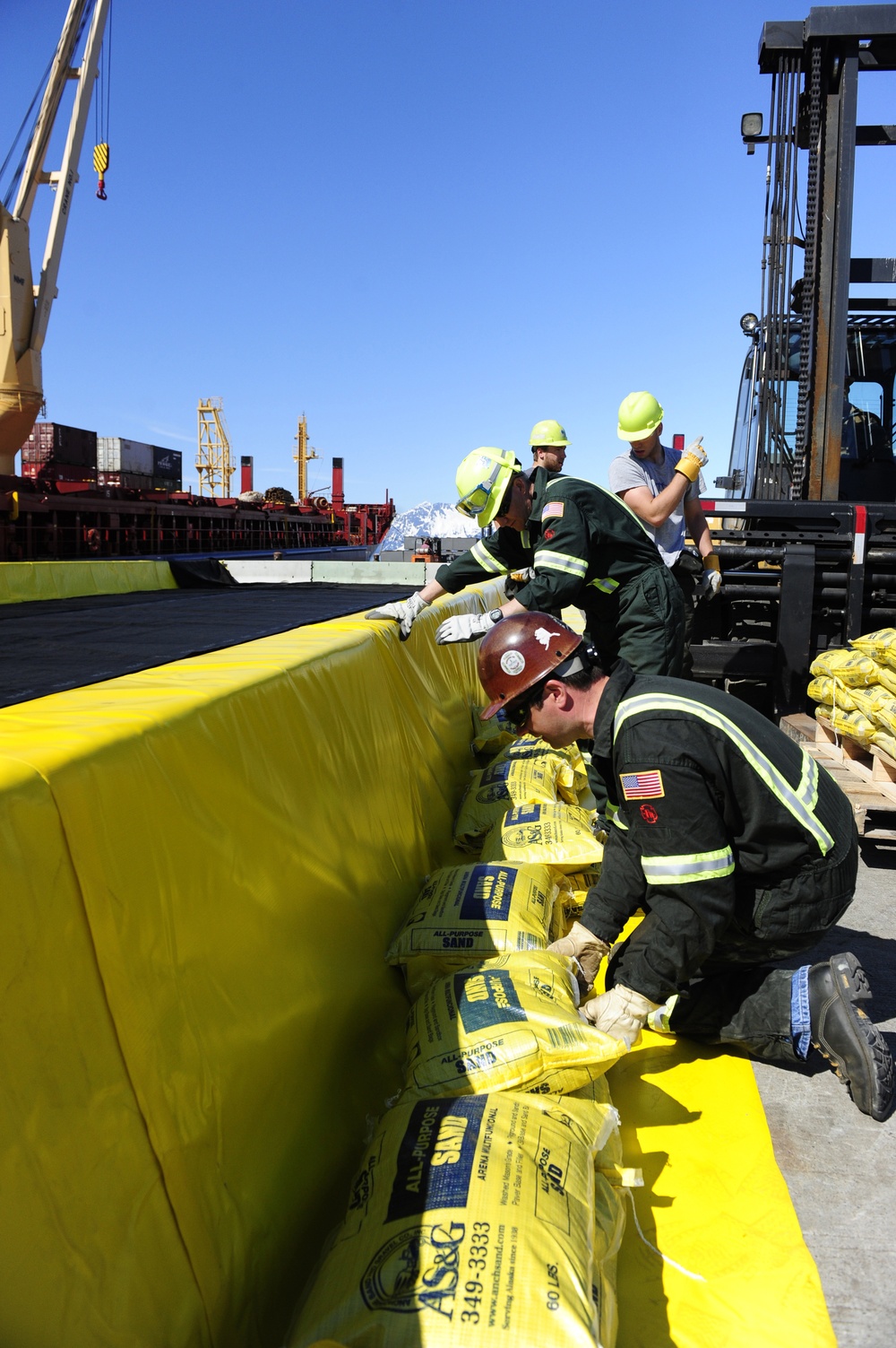 Unified Command to remove, decontaminate leaking oil containers from BBC Arizona