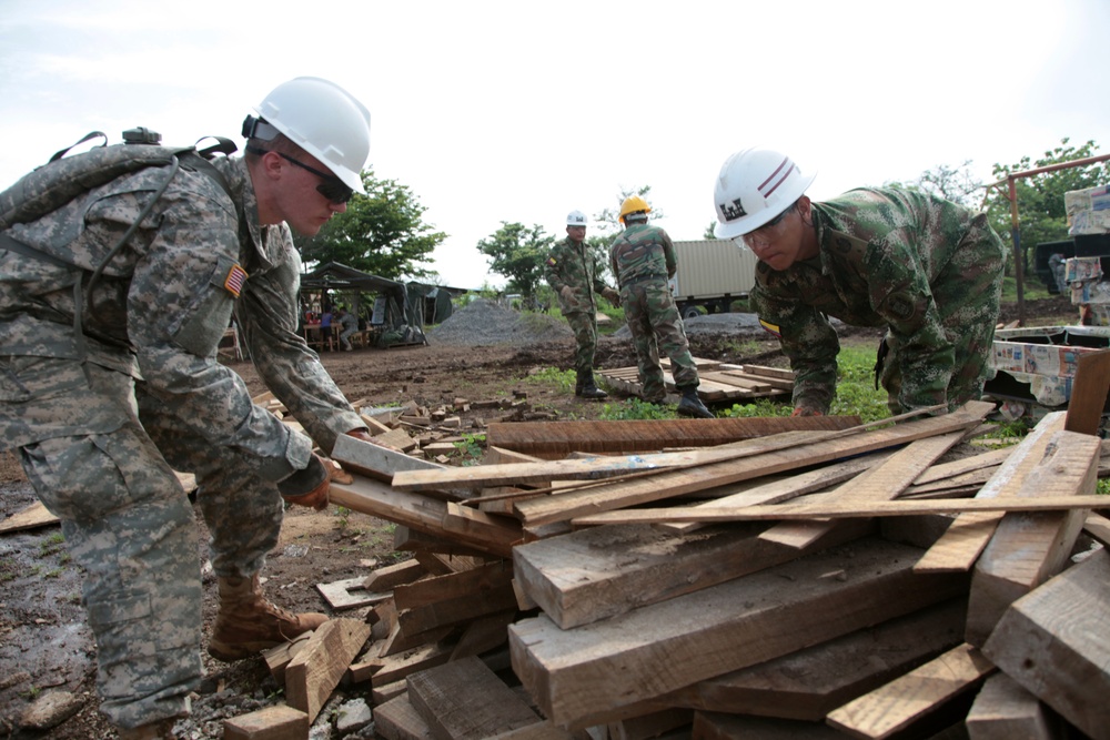 Joint Task Force Jaguar soldiers build school