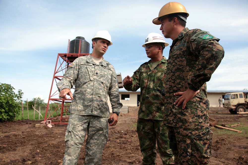 Joint Task Force Jaguar soldiers build school
