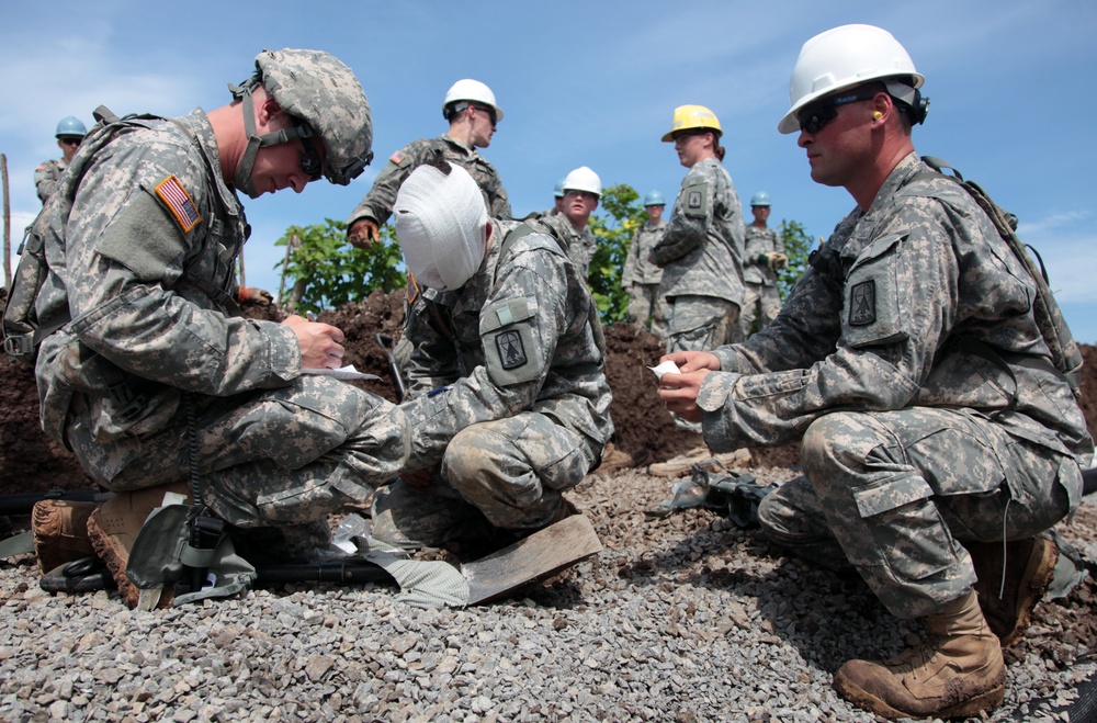 Joint Task Force Jaguar soldiers build school