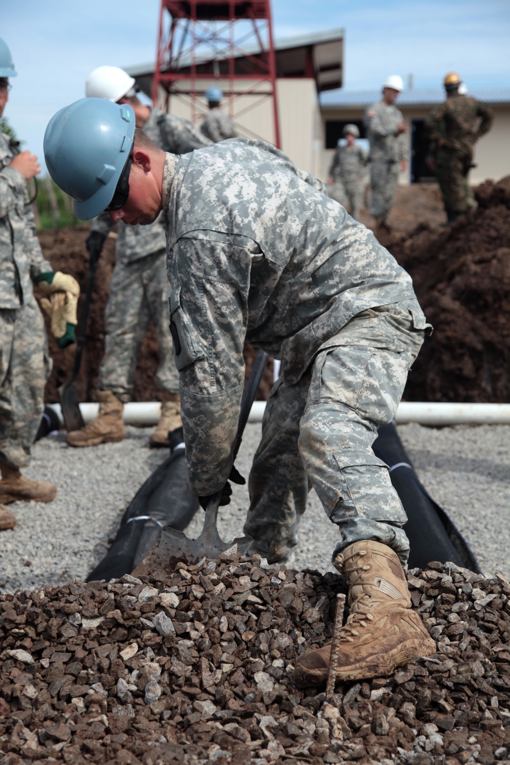 Joint Task Force Jaguar soldiers build school