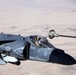 AV-8B Harriers with Marine Attack Squadron 311 Conduct a Refueling Mission