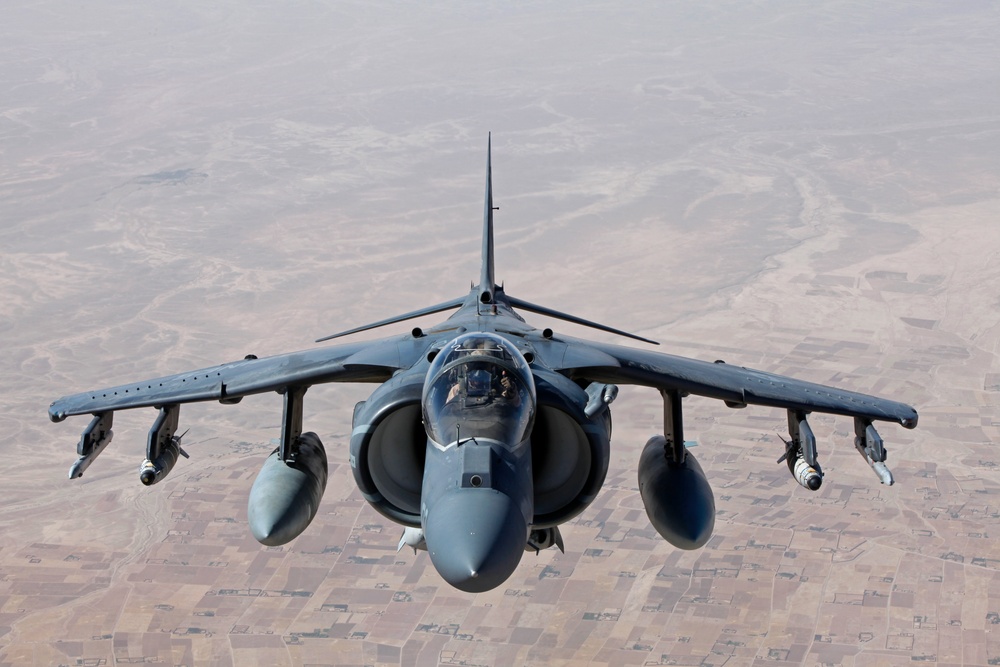 AV-8B Harriers with Marine Attack Squadron 311 Conduct a Refueling Mission