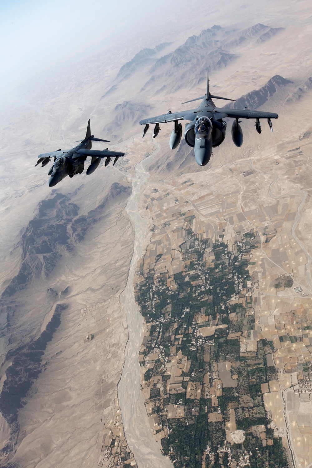 AV-8B Harriers with Marine Attack Squadron 311 Conduct a Refueling Mission