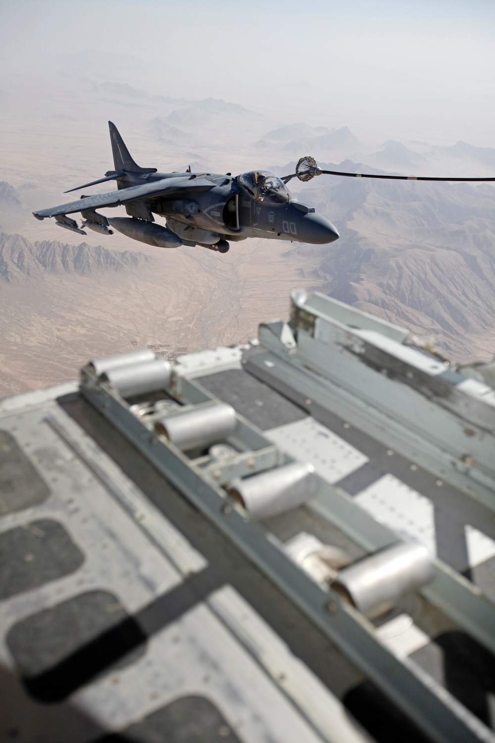 AV-8B Harriers with Marine Attack Squadron 311 Conduct a Refueling Mission