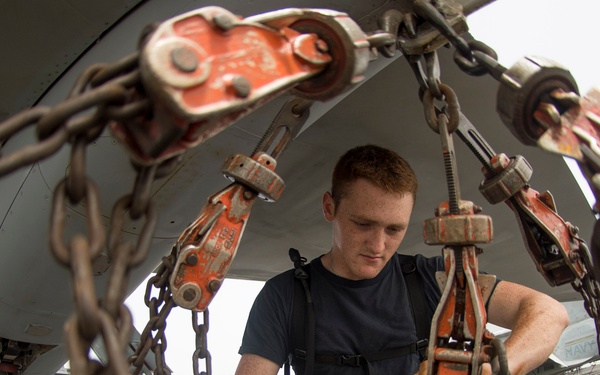 Airman cleans chains