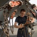 Airman cleans chains