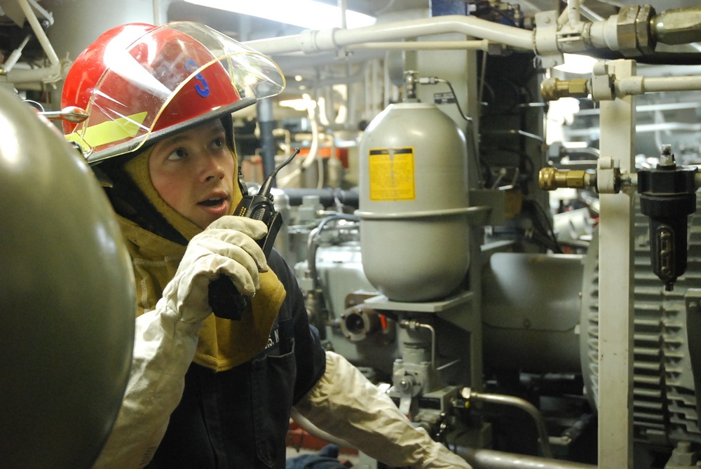 USS Shoup sailor during damage control drill