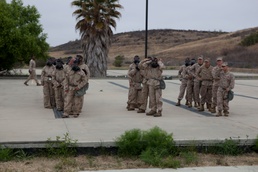 Headquarters Battalion Marines breathe easy during gas chamber training