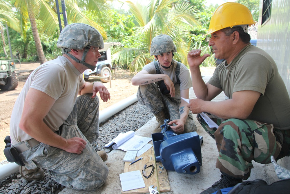 Joint Task Force Jaguar soldiers work to complete schools