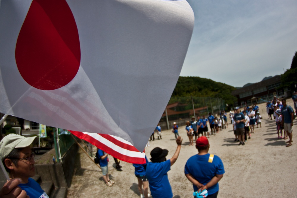 Station residents participate in rice-planting event