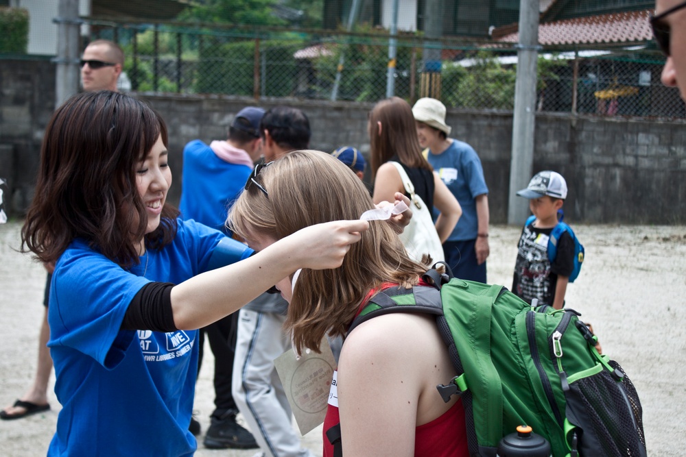 Station residents participate in rice-planting event