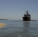 Coast Guard members conduct spilled oil recovery system training
