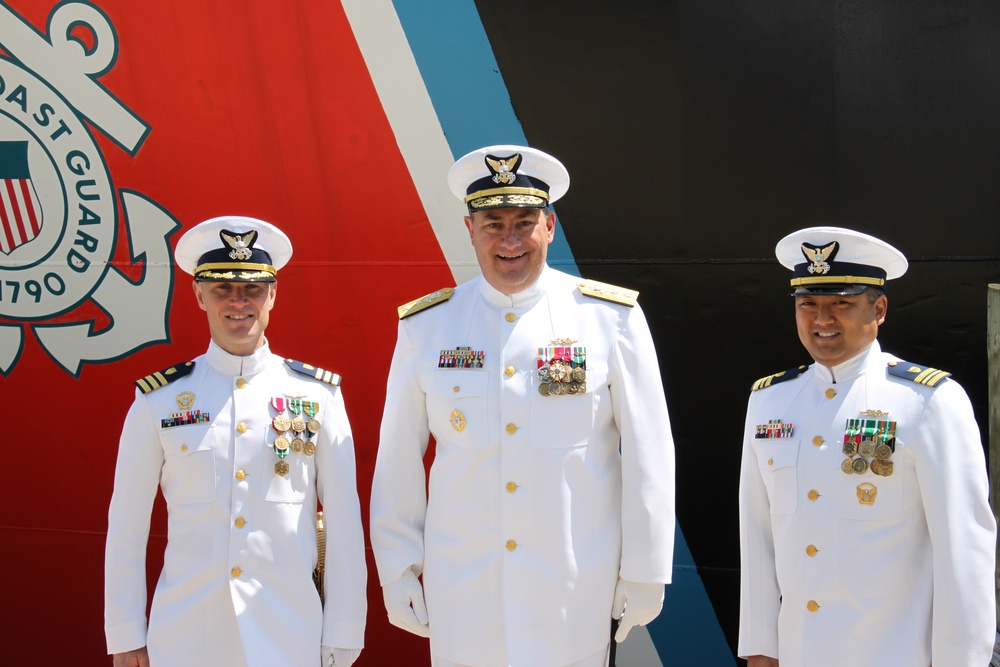 Rear Adm. Michael Parks presides over Coast Guard Cutter Hollyhock change of command
