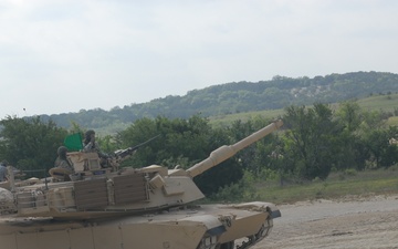 Soldiers from Delta Company, 1-145th Armored Regiment, practice tactical maneuvers with refurbished tanks