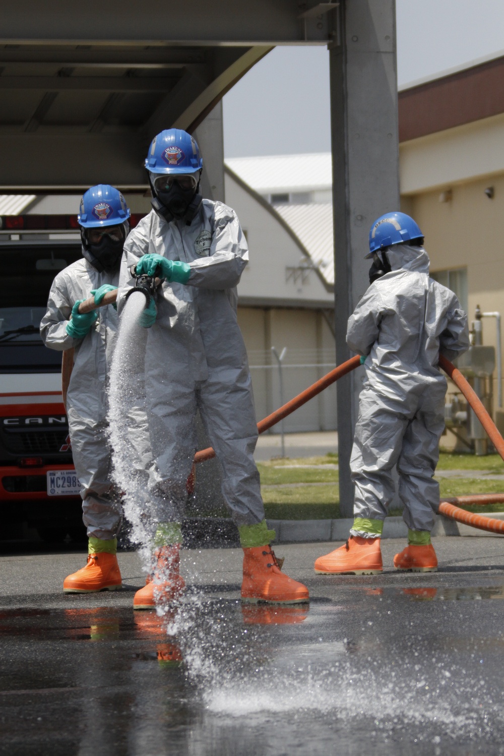 Service members practice for hazardous material safety