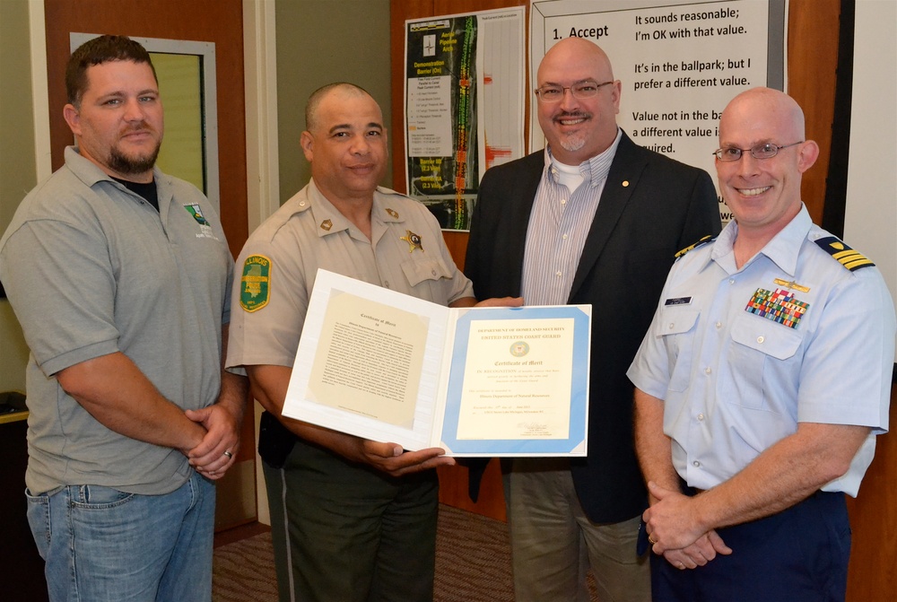 Coast Guard presents award to Illinois Department of Natural Resources for partnership during Fish Barrier operations