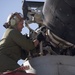 SP-MAGTF CR flightline mechanics replace prop-rotor hub assembly on MV-22 Osprey