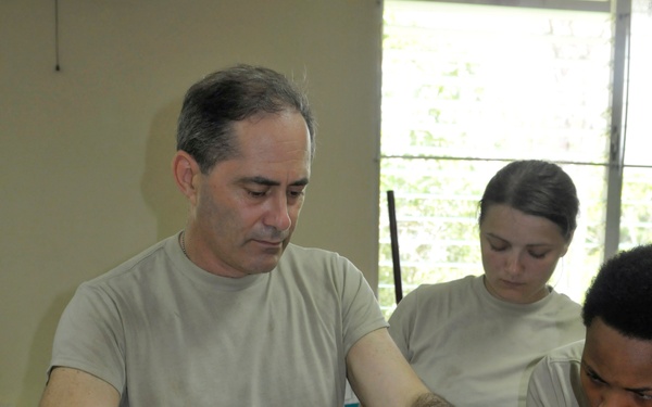 Veterinarian service members save baby monkey at BTH-Panama 2013