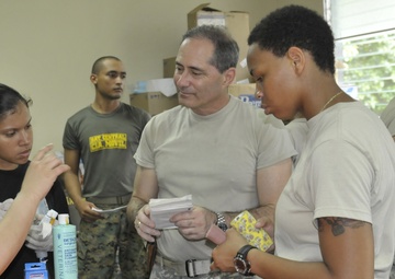 Veterinarian service members save baby monkey at BTH-Panama 2013