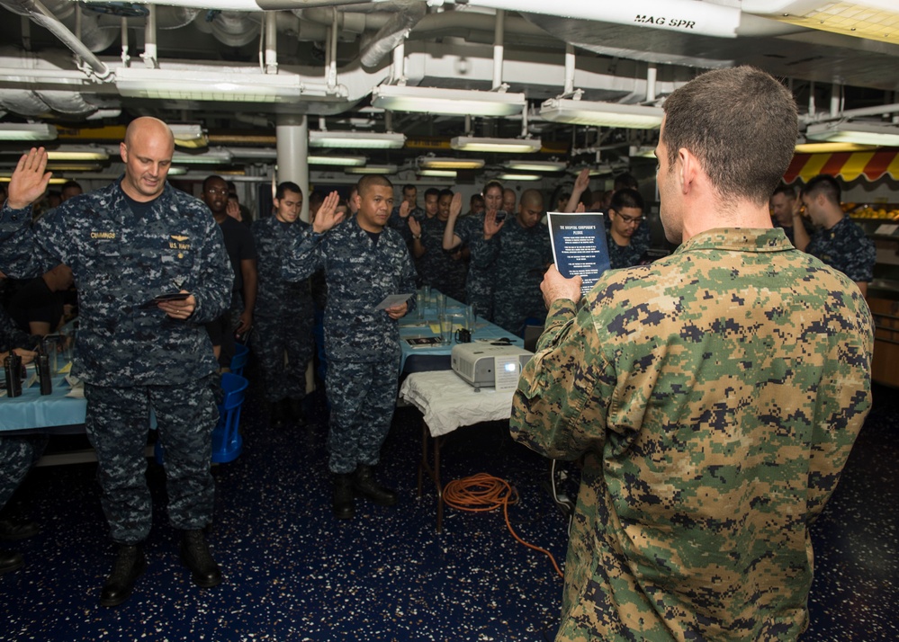 USS Nimitz sailors recite pledge