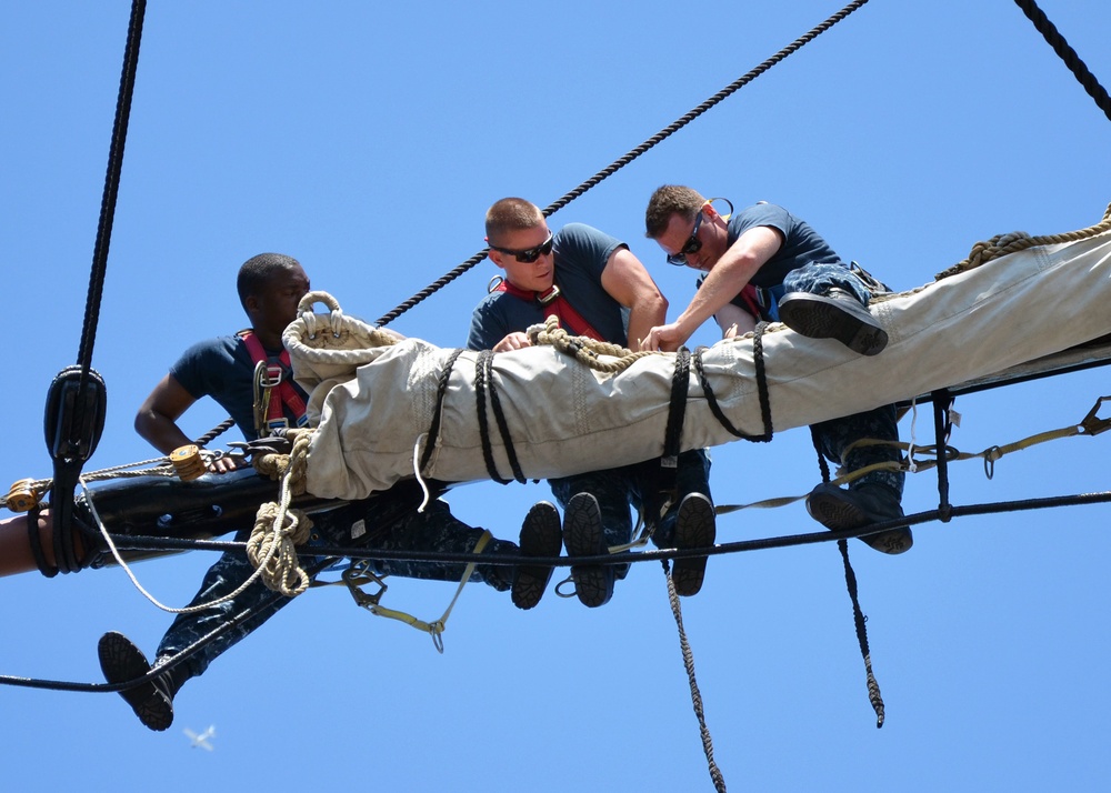 USS Constitution sailors secure a sail