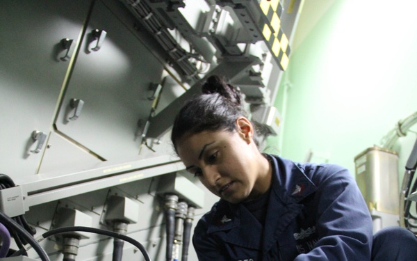 USS Gonzalez sailors at work