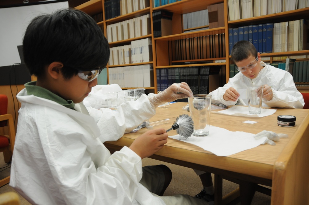 GEMS: Young investigators solve a crime