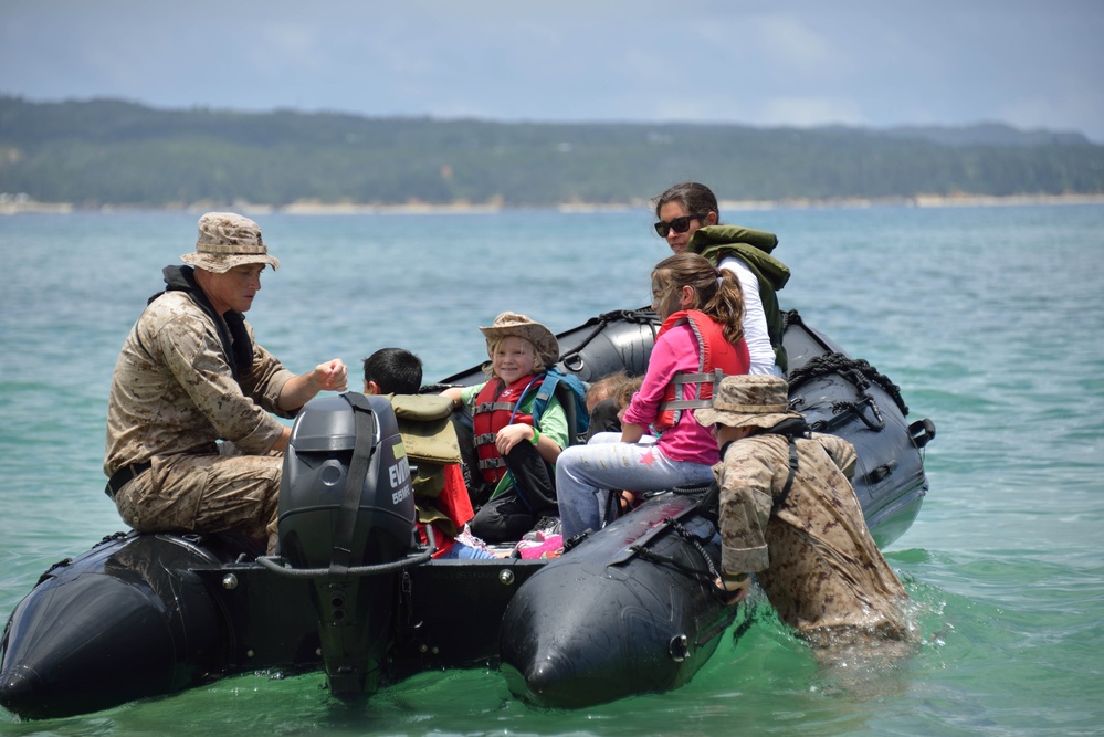 Children spend day in father’s boots