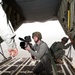 Visual information specialist Richard Herman videotapes airborne operation