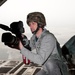 Visual information specialist Richard Herman videotapes airborne operation