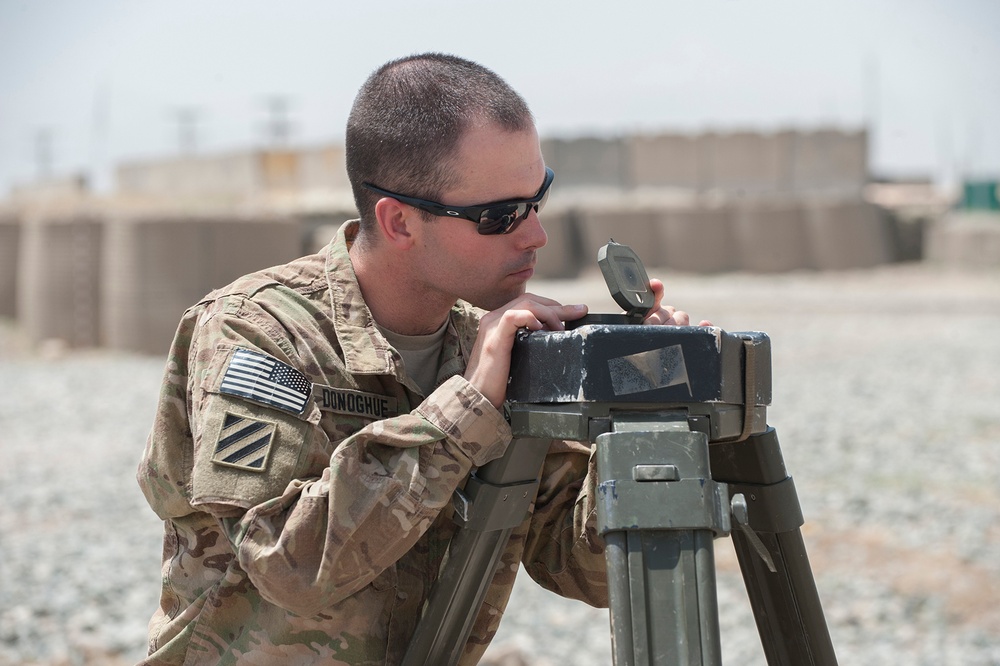 Artillerymen stand ready to counter fire in eastern Afghanistan