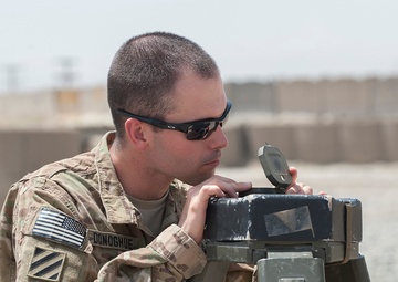 Artillerymen stand ready to counter fire in eastern Afghanistan