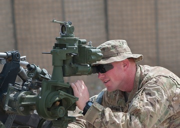 Artillerymen stand ready to counter fire in eastern Afghanistan