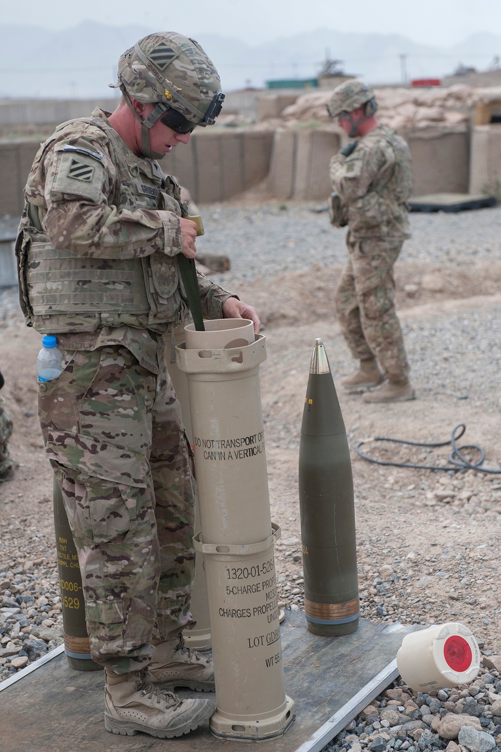 Artillerymen stand ready to counter fire in eastern Afghanistan