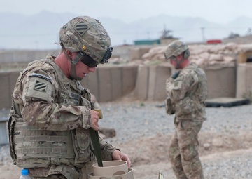 Artillerymen stand ready to counter fire in eastern Afghanistan