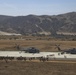 Marines board aircraft for an air assault training exercise for Dawn Blitz 2013