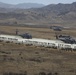 Marines board aircraft for an air assault training exercise for Dawn Blitz 2013