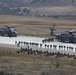 Marines board aircraft for an air assault training exercise for Dawn Blitz 2013