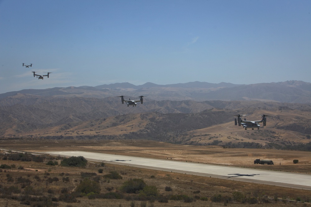 Marines board aircraft for an air assault training exercise for Dawn Blitz 2013