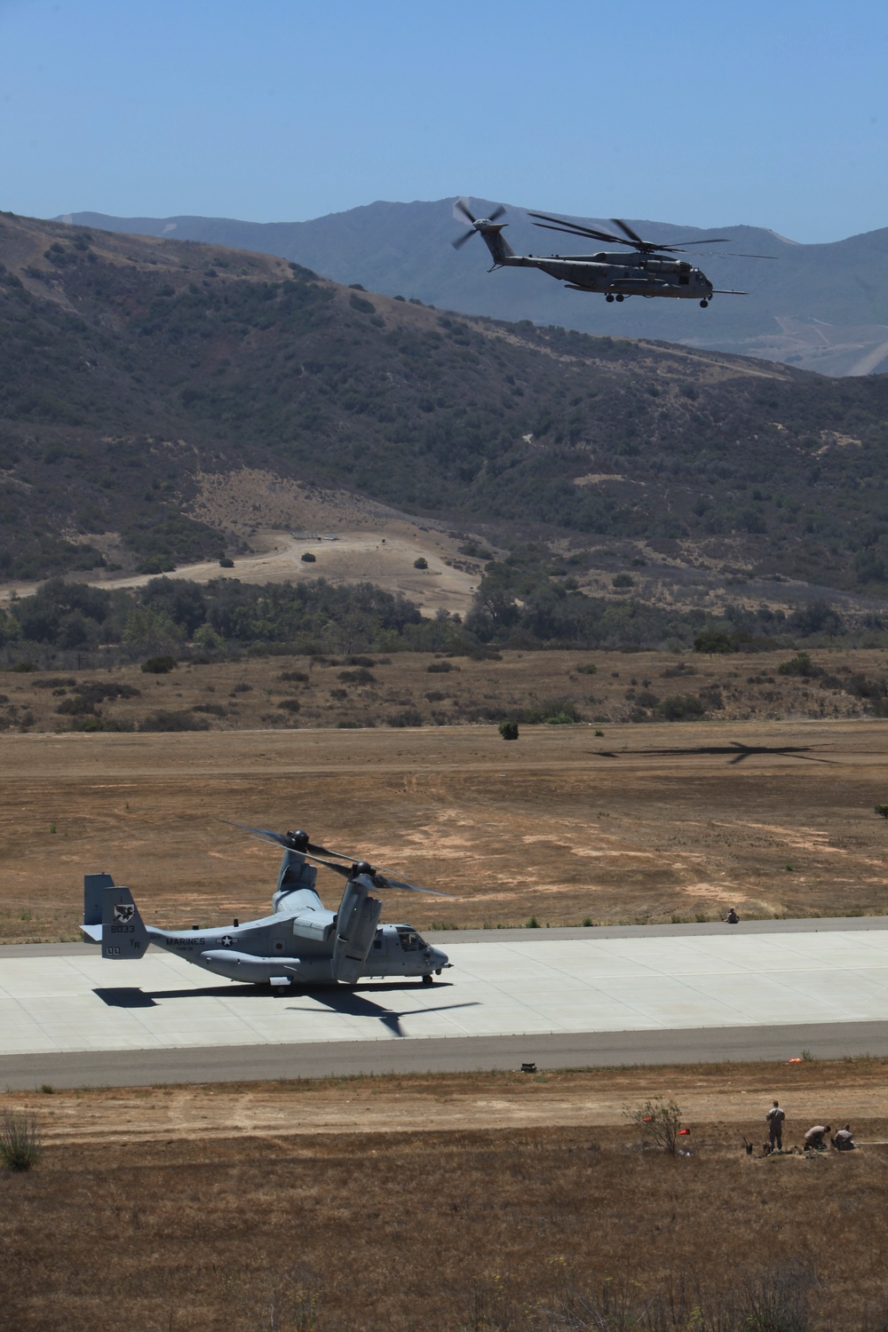 Marines board aircraft for an air assault training exercise for Dawn Blitz 2013