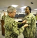 Petty Officer 1st Class Kisha Williams receives The Navy Meritorious Outstanding Volunteer Service Medal