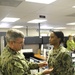 Petty Officer 1st Class Felicia Williams receives the Navy and Marine Corps Achievement Medal