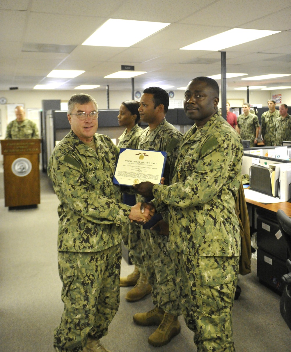LCDR Lindsey Graves receives the Navy and Marine Corps Achievement Medal