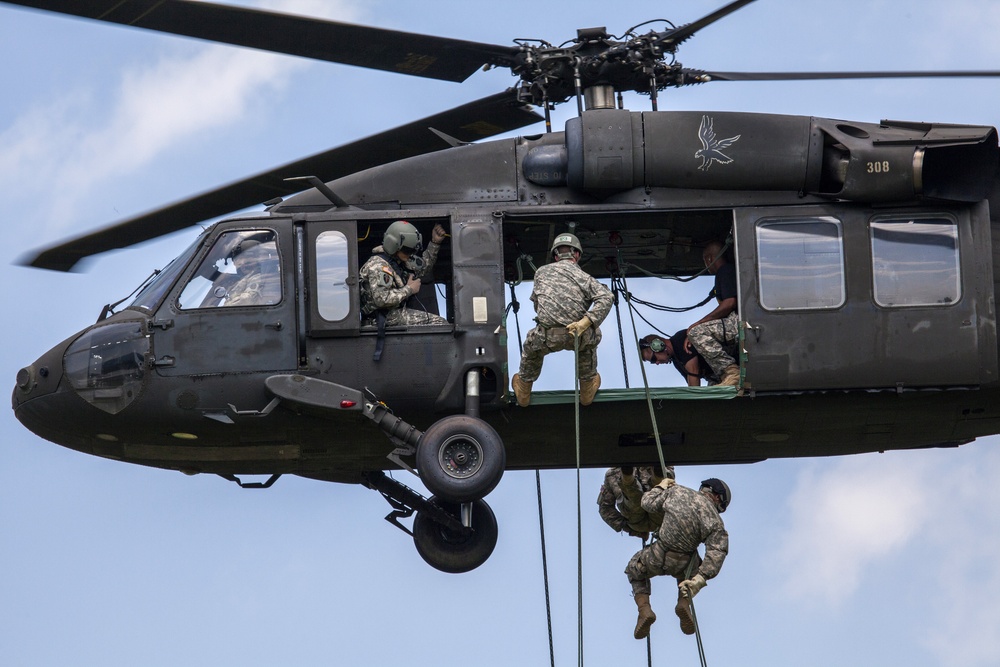 Cadets rappel from Guard Black Hawks