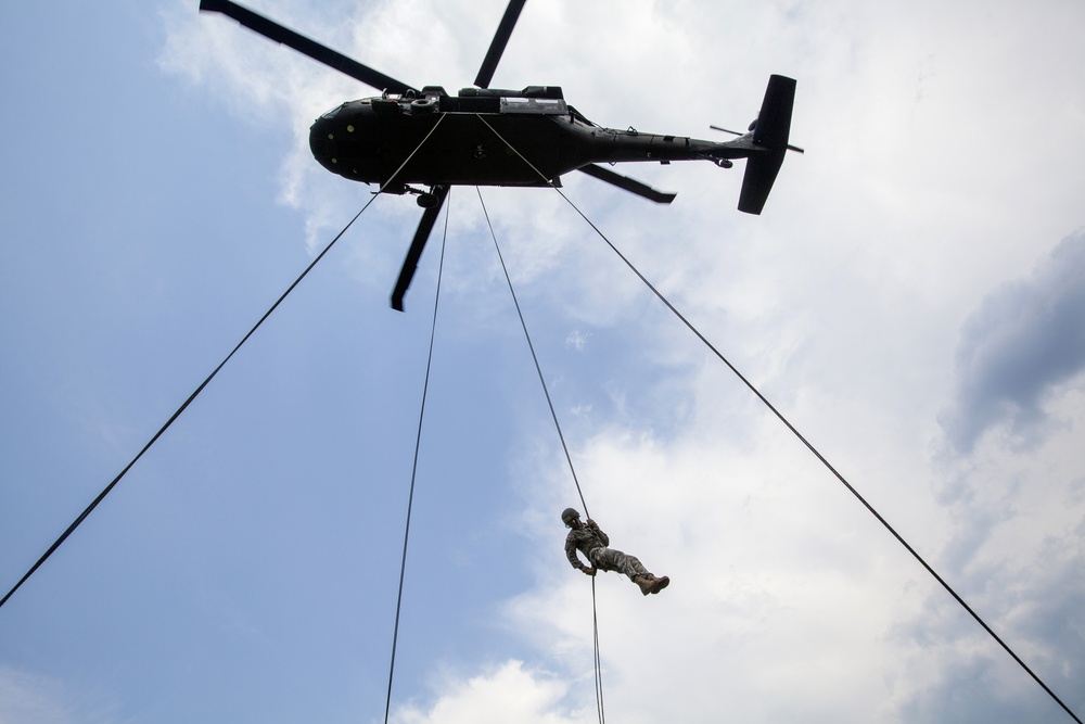 Cadets rappel from Guard Black Hawks