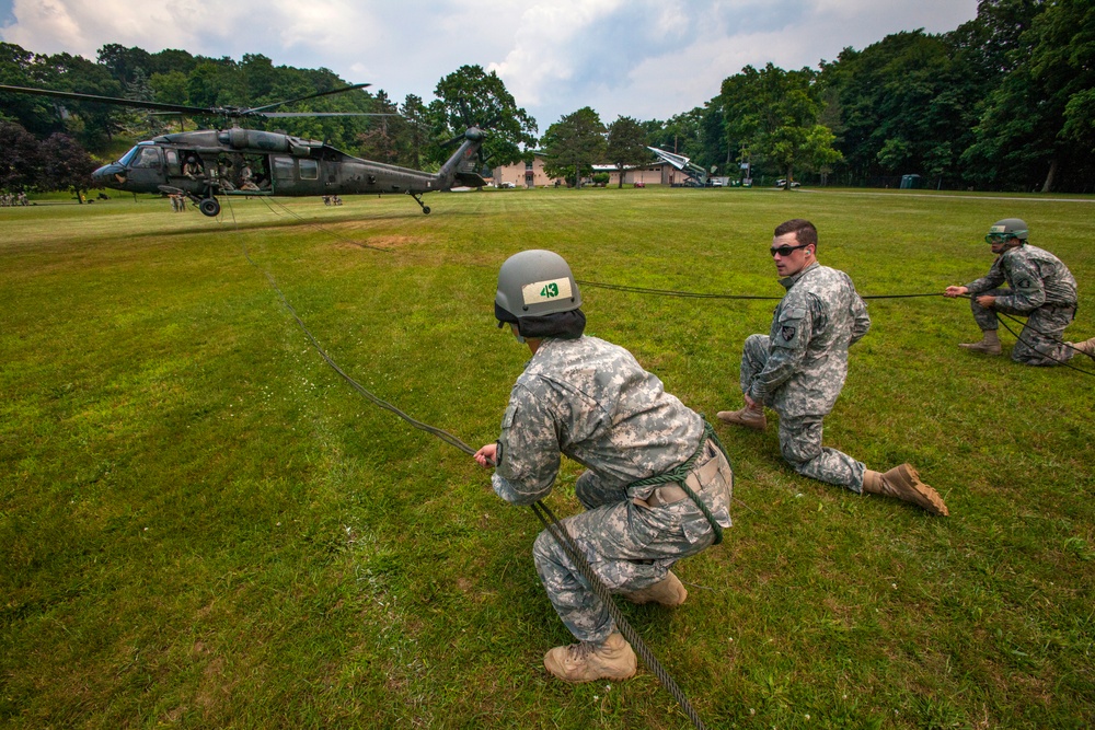 Cadets rappel from Guard Black Hawks