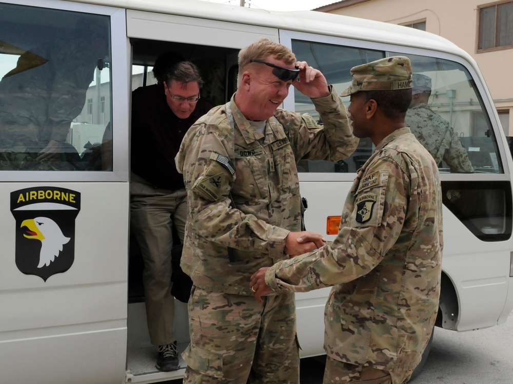 Joint senior logisticians walk disposition services yard in Bagram