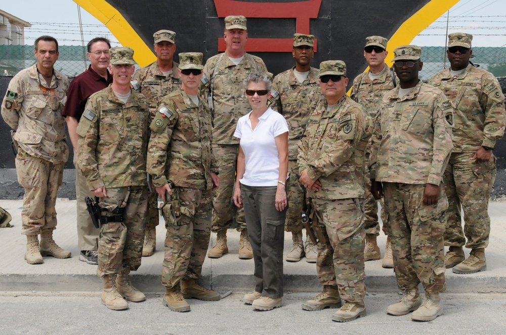 Joint senior logisticians walk disposition services yard in Bagram
