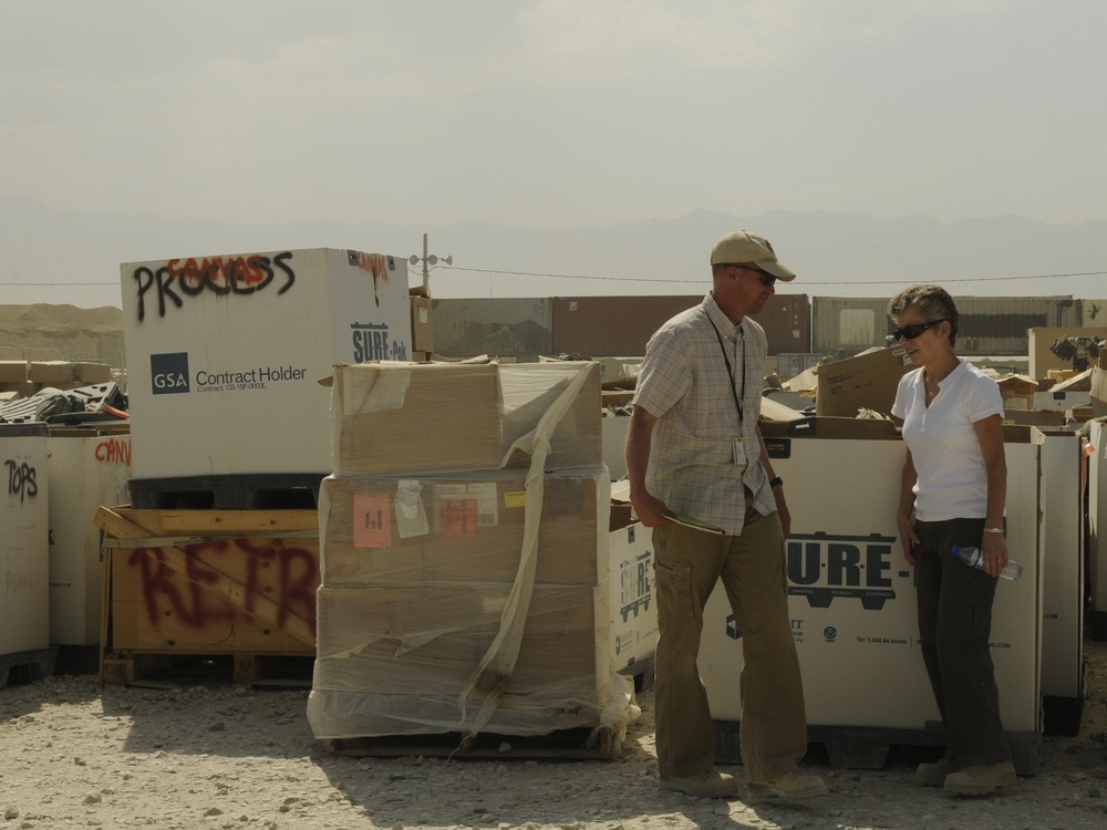 Joint senior logisticians walk disposition services yard in Bagram